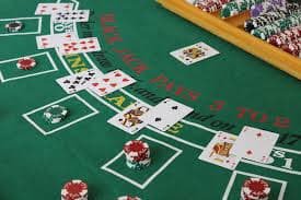 Live baccarat table with dealer at professional studio on lunatoto login